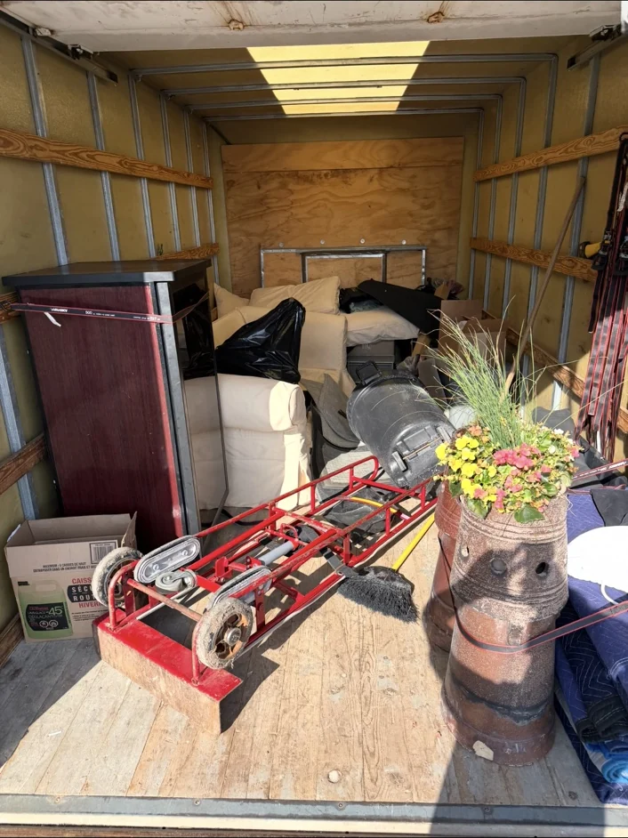 Furniture and bulky items loaded for junk removal