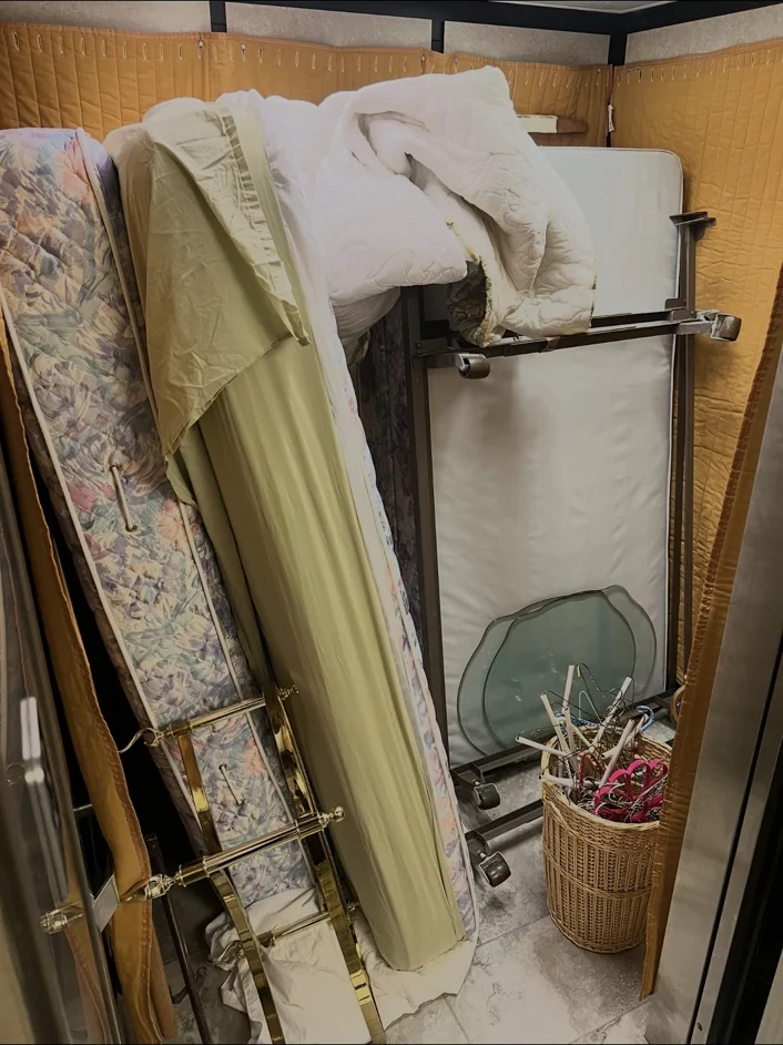 Mattress and household items loaded for removal
