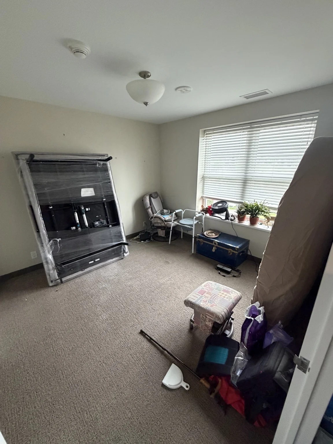Furniture wrapped and prepared in a bedroom